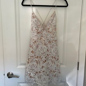 White dress with deep v neck, lined. Size medium